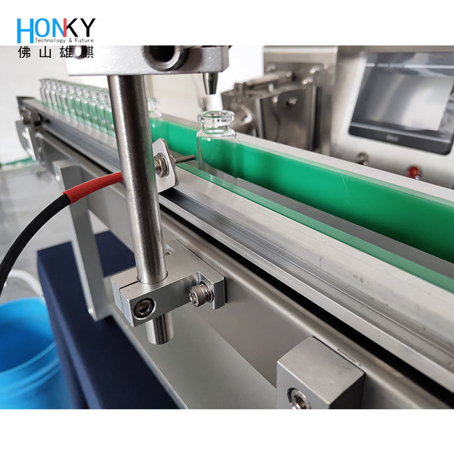 Linea da scrivania tipo Vial Machine di riempimento Piccola linea di riempimento con convogliatore di alimentazione della bottiglia e Samll Bach Per la cura della pelle Oil di riempimento