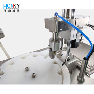 Desktop Essential Automatic Filling and Capping Machine con sistema di tappo servomotore per imballaggio di bottiglie di vetro